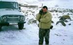 Tajikistan-Hunter-Calling-home-on-his-satellite-phone